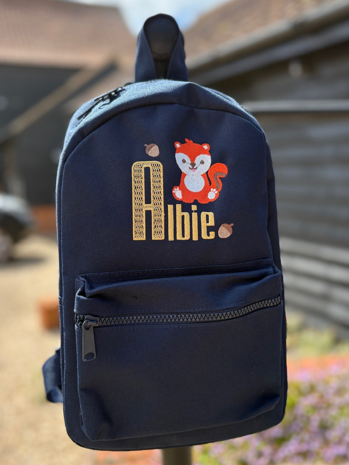 Custom name rucksack and lunchbox with squirrel and nut design