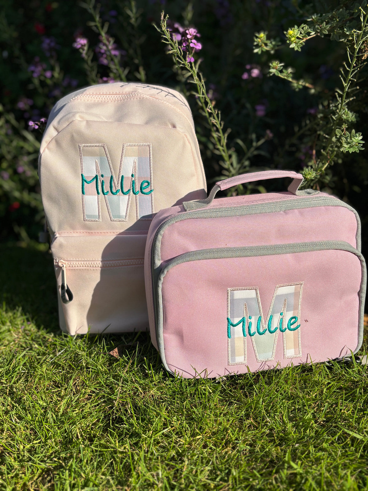 Appliquéd initial backpack and lunch bag for nursery