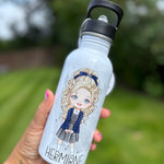 Water bottle with a character design and 'Hermione' text, held outdoors.