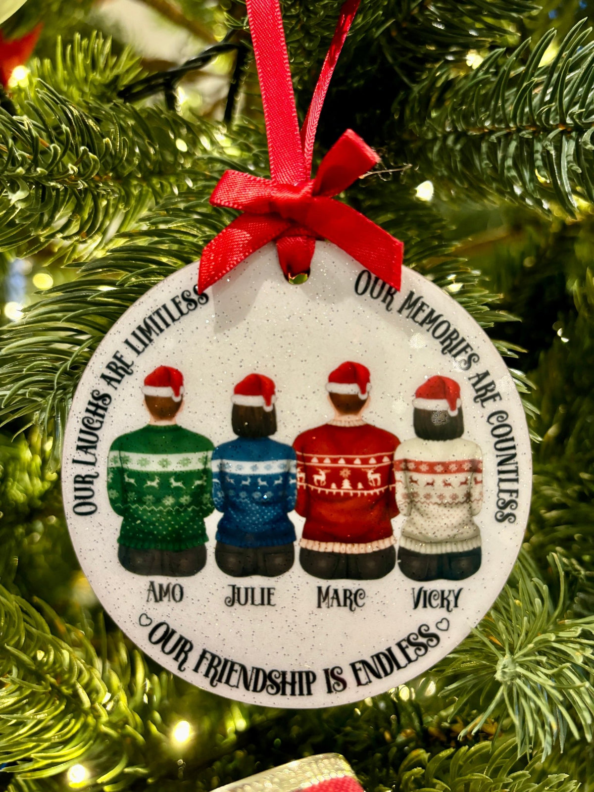 Holiday bauble with friend’s name and decorative stars