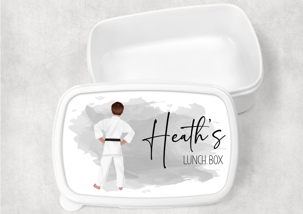 Personalised karate lunch box with child's name and martial arts design.